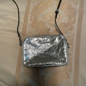 Micheal Kors silver bag (never worn)